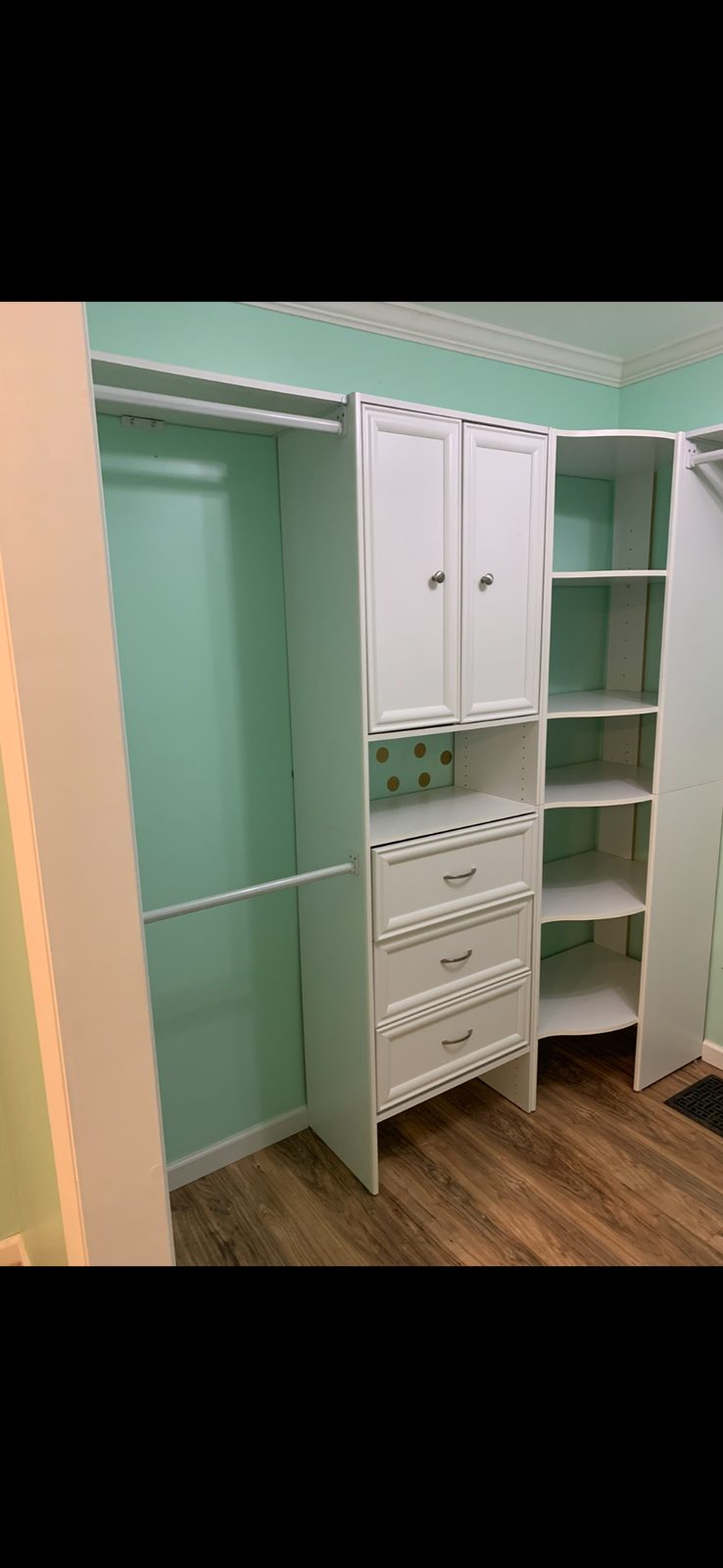 Additional custom closet cabinetry photo in Grand Rapids with drawers and shelving